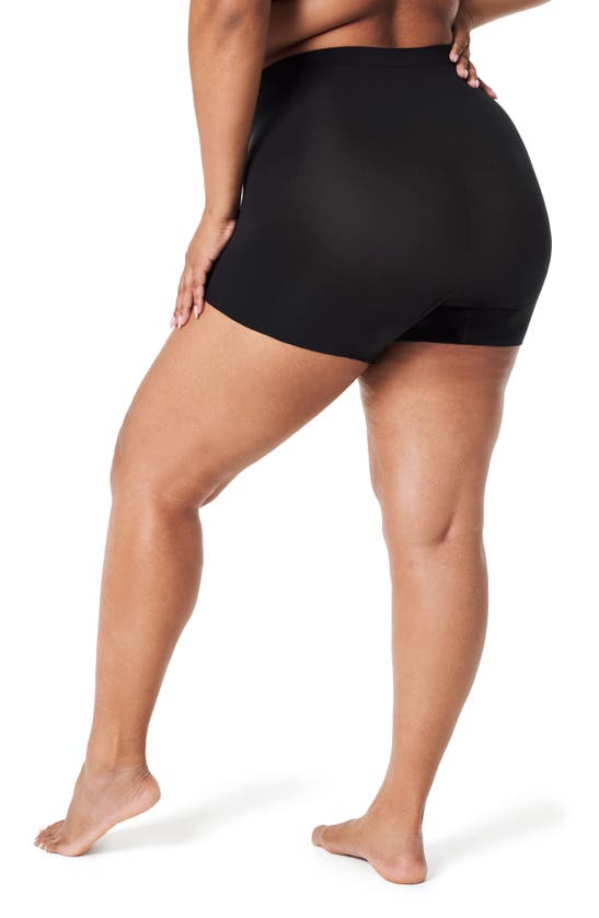 Shop Spanx Shorty Seamless Shaper Shorts In Very Black