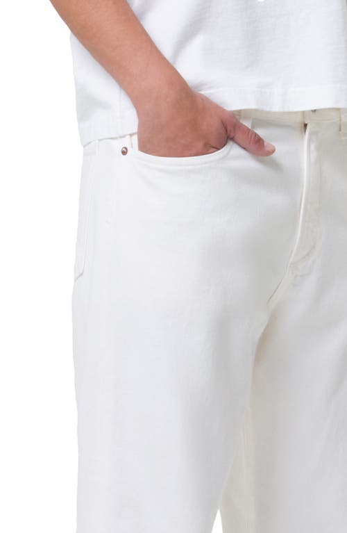 Shop Agolde Curtis Relaxed Tapered Organic Cotton Jeans In Fortune Cookie