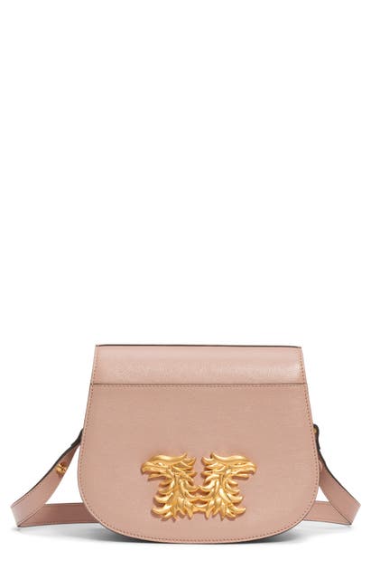 Click to view more detailed imagery on our partner's website Valentino Garavani Maison Gryphon Leather Saddle Bag In Rose Cannelle