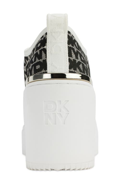 Shop Dkny Byla Wedge Sneaker In White/black