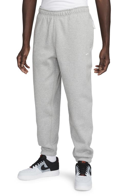 Nike Solo Swoosh Fleece Sweatpants In Dark Grey Heather/white
