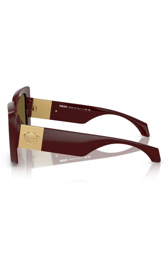 Shop Versace 54mm Irregular Sunglasses In Dark Ruby