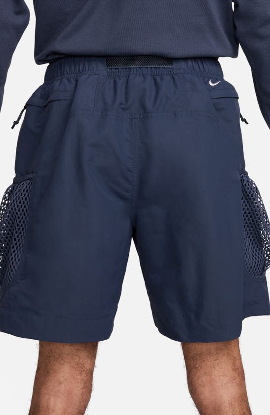 Shop Nike Snowgrass Water Repellent Nylon Cargo Shorts In Thunder Blue/summit White