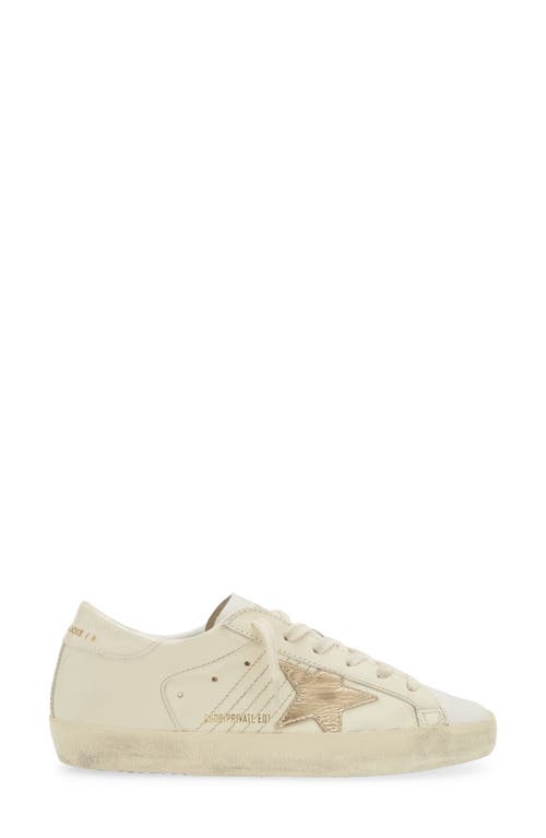 Shop Golden Goose Super-star Low Top Sneaker In Milk/gold