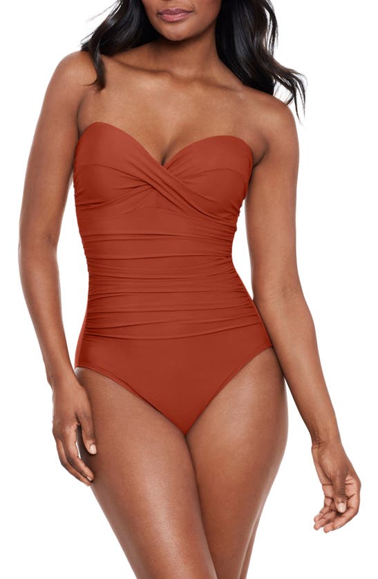 Shop Miraclesuit Rock Solid Madrid Bandeau One-piece Swimsuit In Spice
