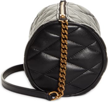 Sade quilted leather clutch