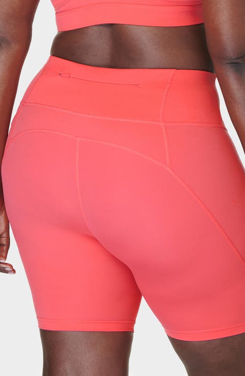 Shop Sweaty Betty Bike Shorts In Coral Pink