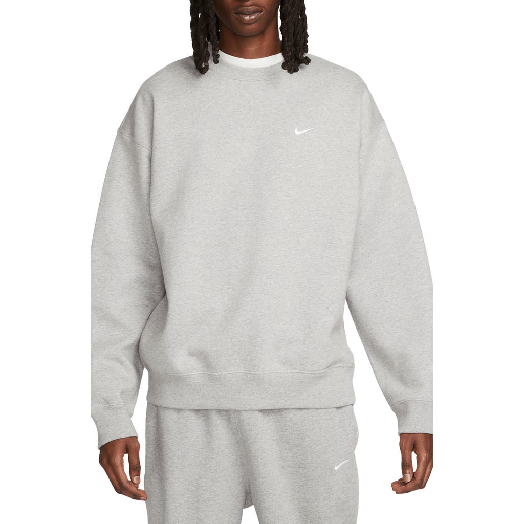 Shop Nike Solo Swoosh Oversize Crewneck Sweatshirt In Dark Grey Heather/white
