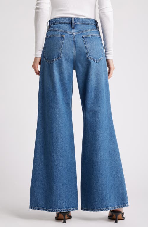 Shop Frame Easy Wide Flare Jeans In Lucite