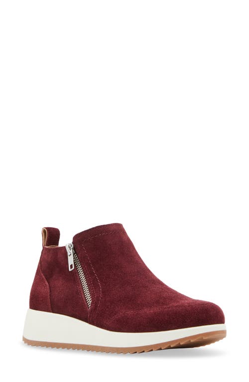 Shop Blondo Ellorie Waterproof Wedge Sneaker In Wine Suede