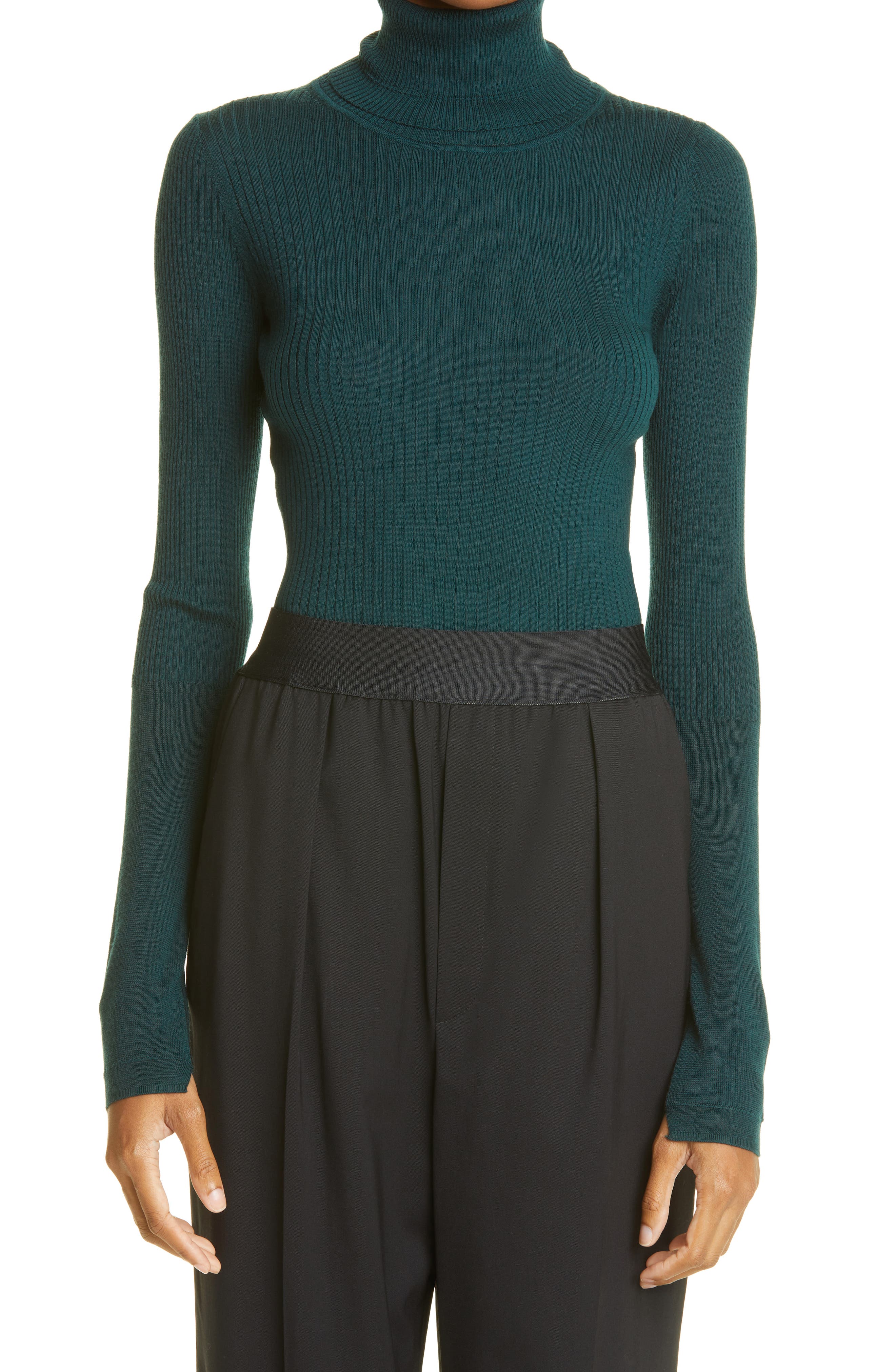 green roll neck top