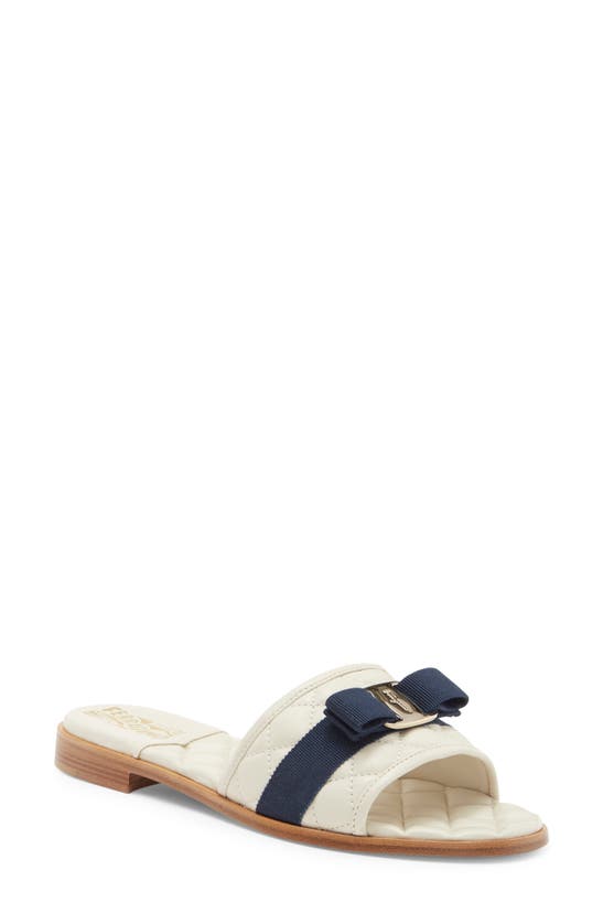 Shop Ferragamo Lovec Q Bow Quilted Slide Sandal In Mascarpone