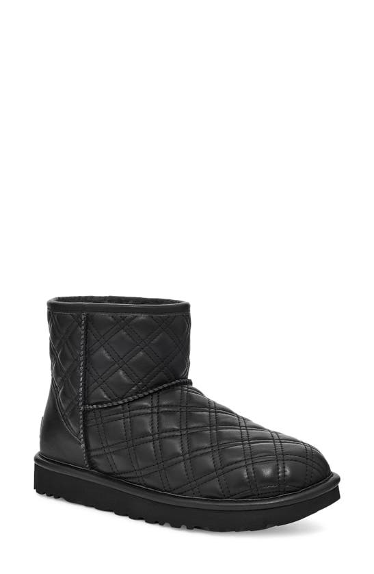 Ugg Classic Mini Ii Quilted Genuine Shearling Lined Bootie In Black