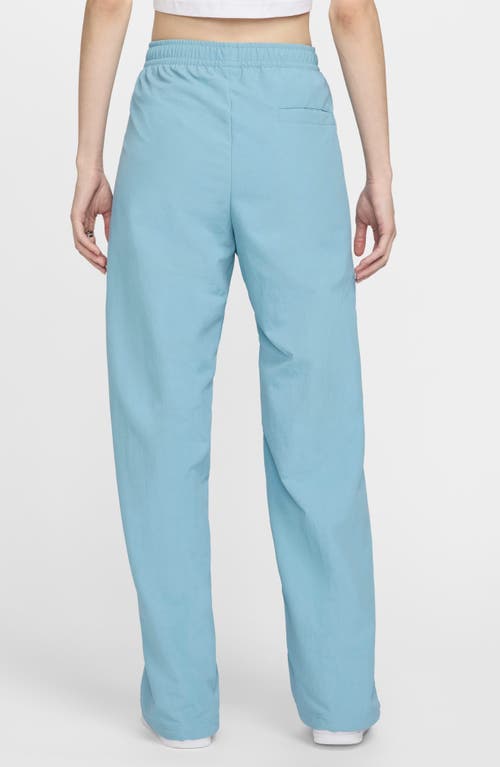 Shop Nike Wide Leg Pants In Denim Turquoise/sail