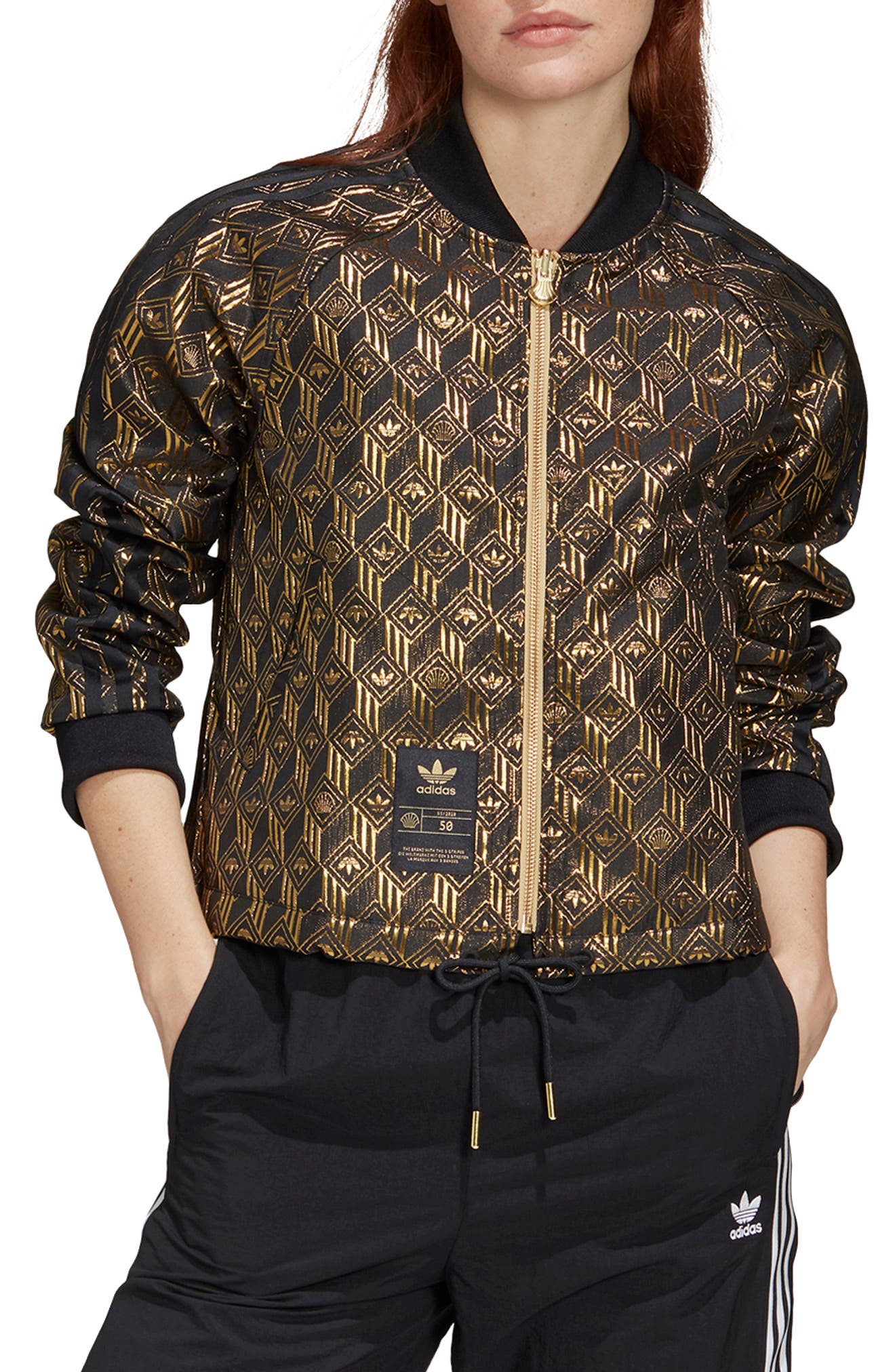 brown and gold adidas jacket