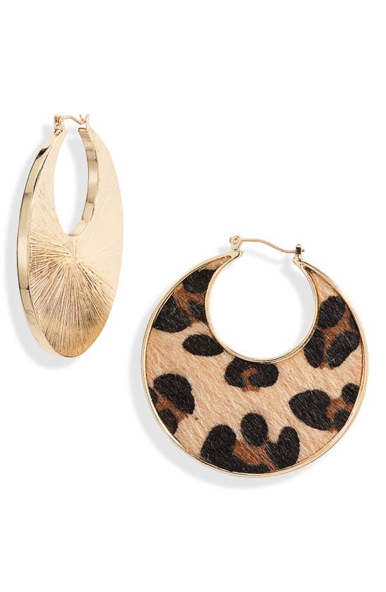 Click to view more detailed imagery on our partner's website Stella & Ruby Genuine Calf Hair Hoop Earrings In Gold/ Leopard