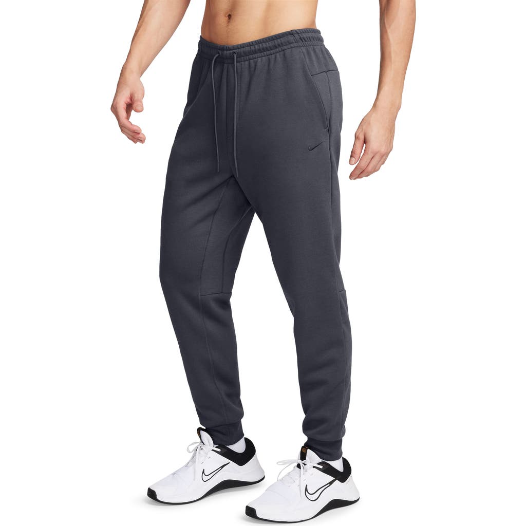 Nike Men's Primary Dri-fit Uv Tapered Versatile Pants In Obsidian/heather