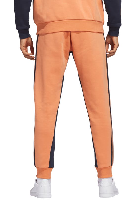 Adidas Originals Sst Fleece Track Pants In Hazy Copper/ Legend Ink ModeSens