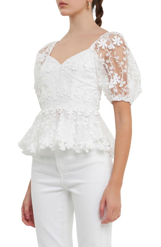 Shop Endless Rose Floral Lace Puff Sleeve Peplum Top In White