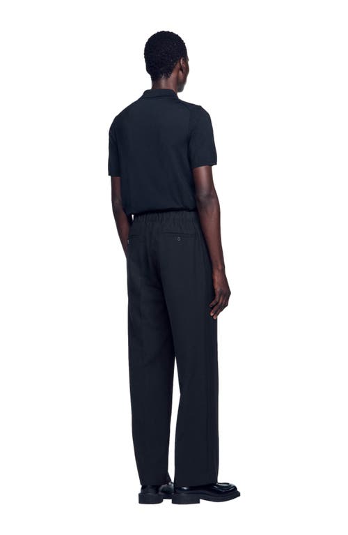 Shop Sandro Wide-leg Trousers In Black