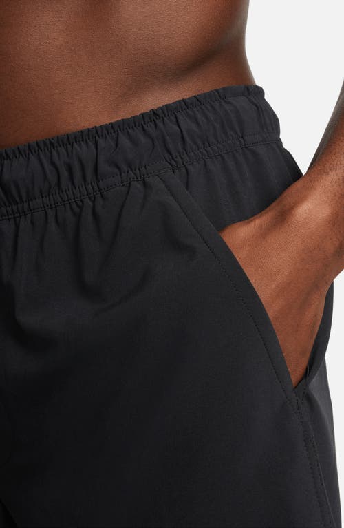 Shop Nike Dri-fit Unlimited 2-in-1 Versatile Shorts In Black/black/black