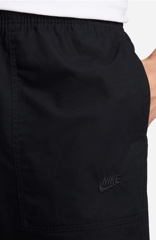 Shop Nike Sportswear Club Barcelona Woven Cotton Pants In Black/black