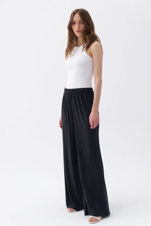 Shop Nocturne Loose Fit Wide Leg Pants In Black