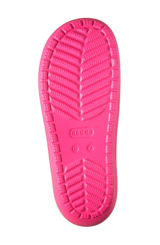 Shop Crocs Classic Neon Slide Sandal In Pink Crush