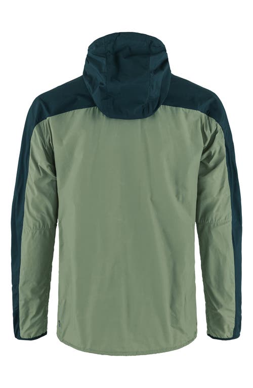 Shop Fjall Raven Fjällräven High Coast Hooded Wind Jacket In Patina Green-navy