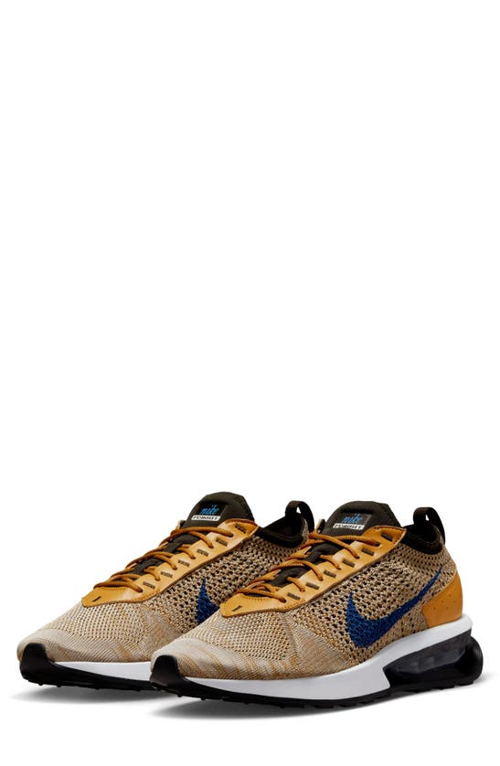 Nike Air Max Flyknit Racer Sneaker In Elemental Gold/ Hyper/ Royal