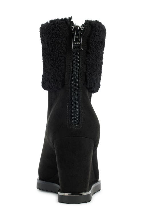 Shop Dkny Powell Faux Shearling Wedge Bootie In Blk - Black