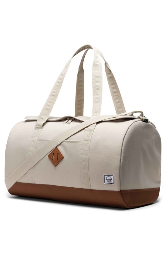 Shop Herschel Supply Co . Heritage Duffle Bag In Light Pelican