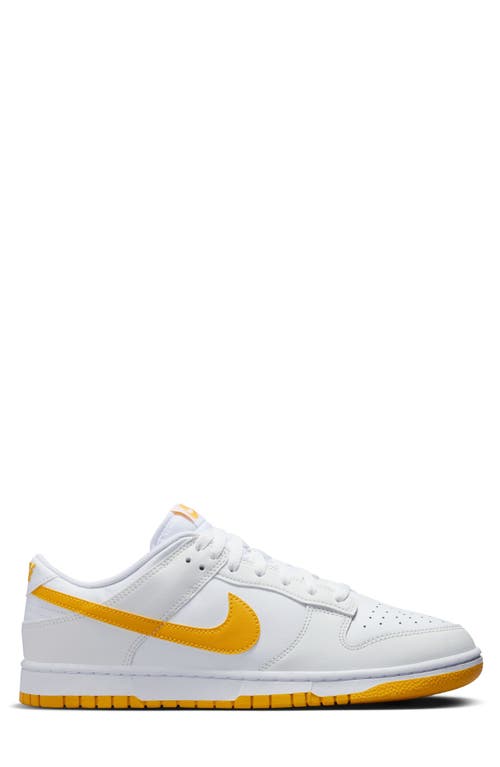 Shop Nike Dunk Low Retro Basketball Sneaker In White/university Gold/white