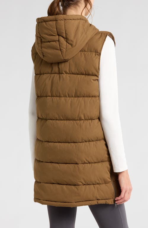 Shop Zella Long Hooded Puffer Vest In Brown Teak