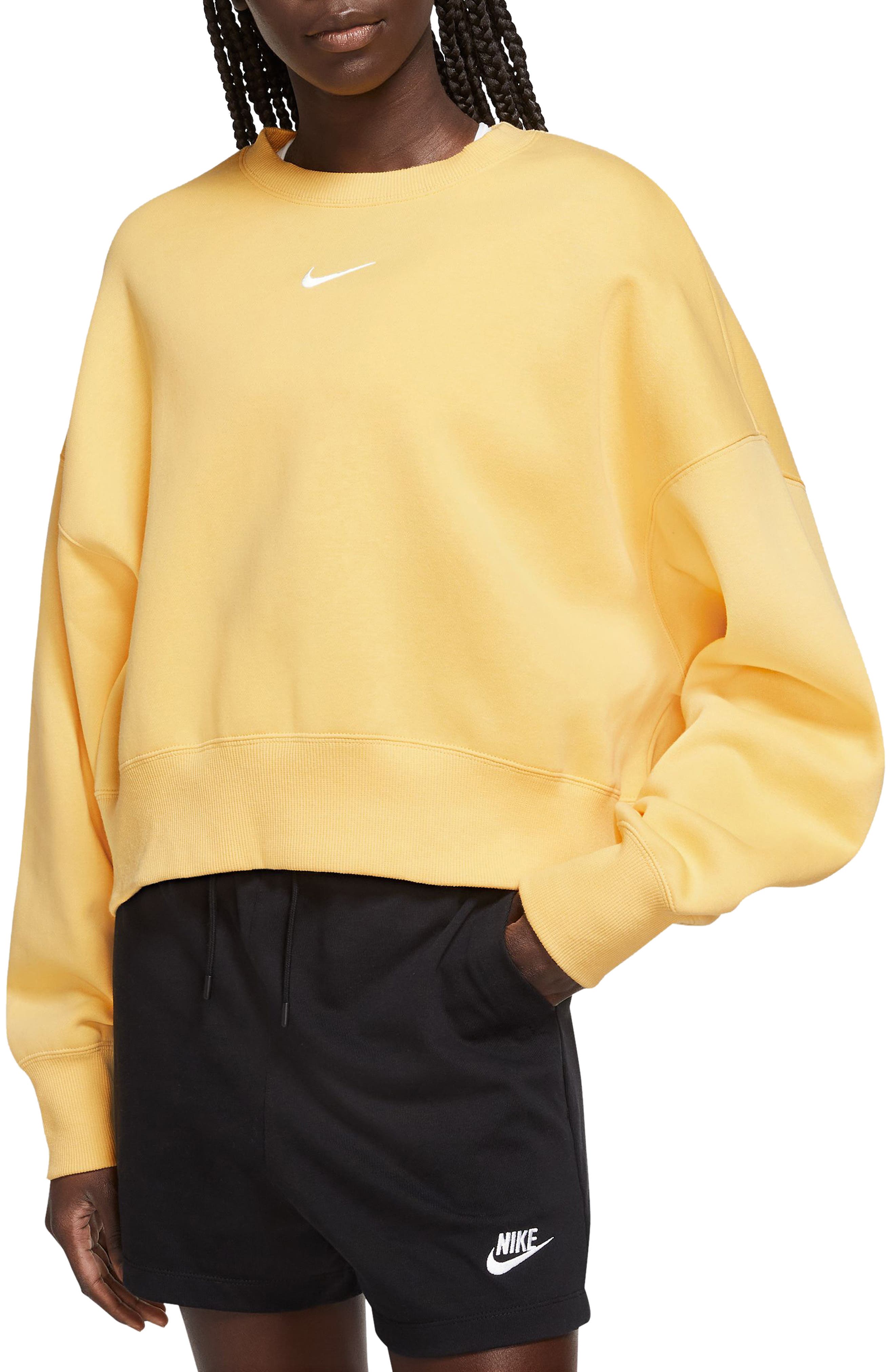 Pale yellow best sale nike sweatshirt