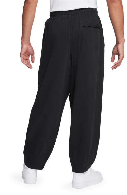 Shop Nike Club Fleece Oversize Pants In Black/black/white