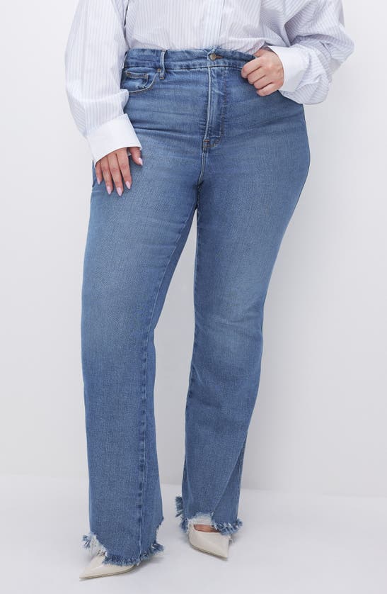 Shop Good American Good Curve Chew Hem Bootcut Jeans In Indigo631