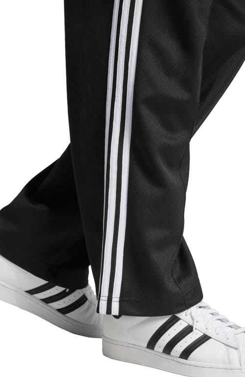 Shop Adidas Originals Adicolor Firebird Baggy Fit Track Pants In Black