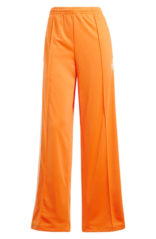 Shop Adidas Originals Firebird Track Pants In Orange