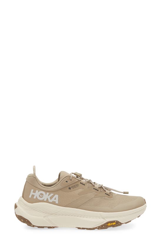 Shop Hoka Transport Gore-tex® Waterproof Running Shoe In Dune / Eggnog