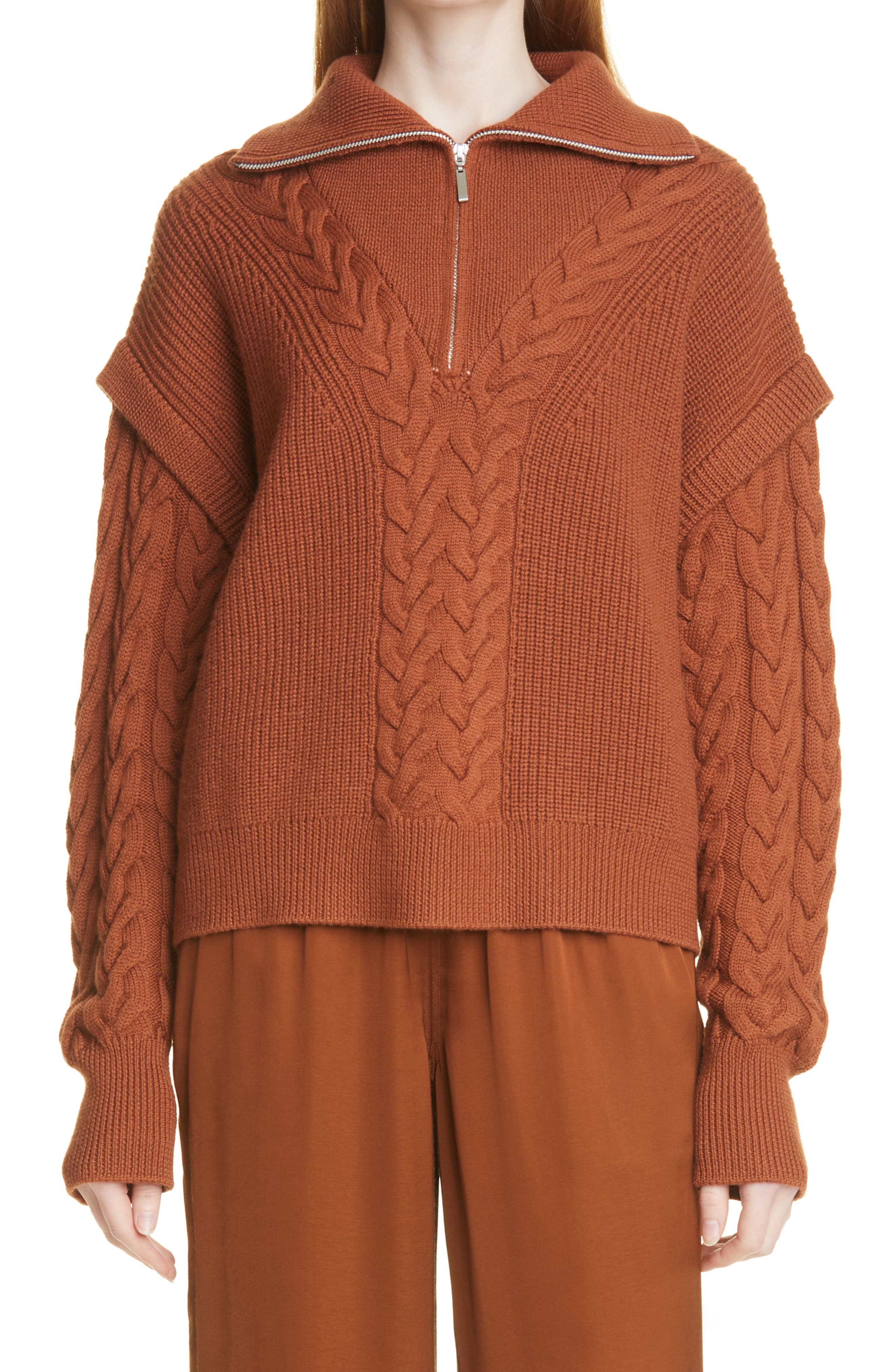 rust colored cable knit sweater
