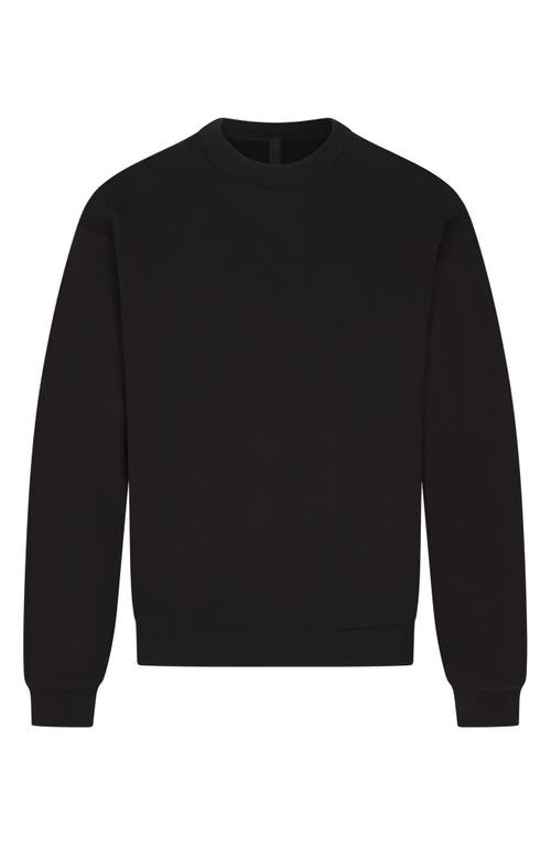 Shop Skims Oversize Cotton Crewneck Sweatshirt In Washed Obsidian