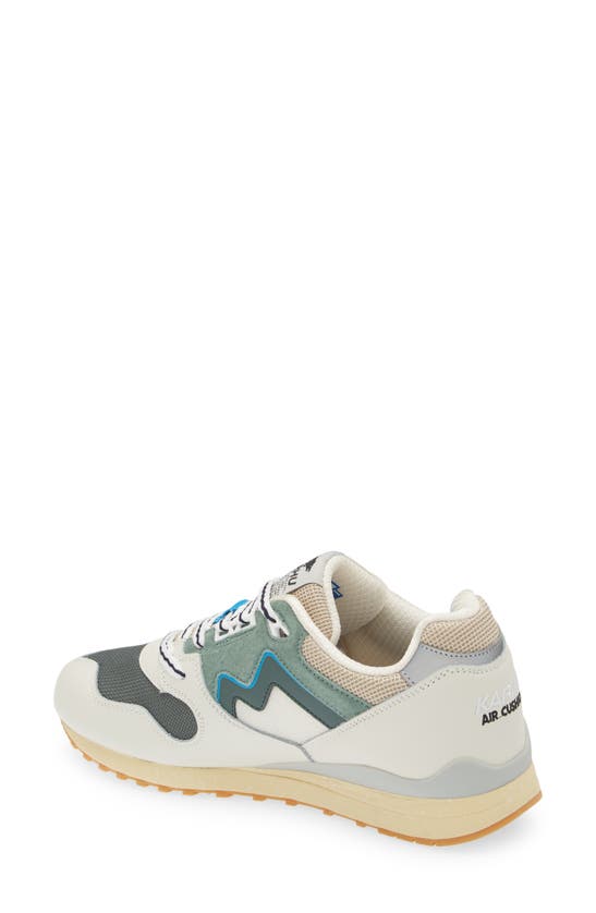 Shop Karhu Gender Inclusive Synchron Classic Sneaker In Lily White/ Forest Green
