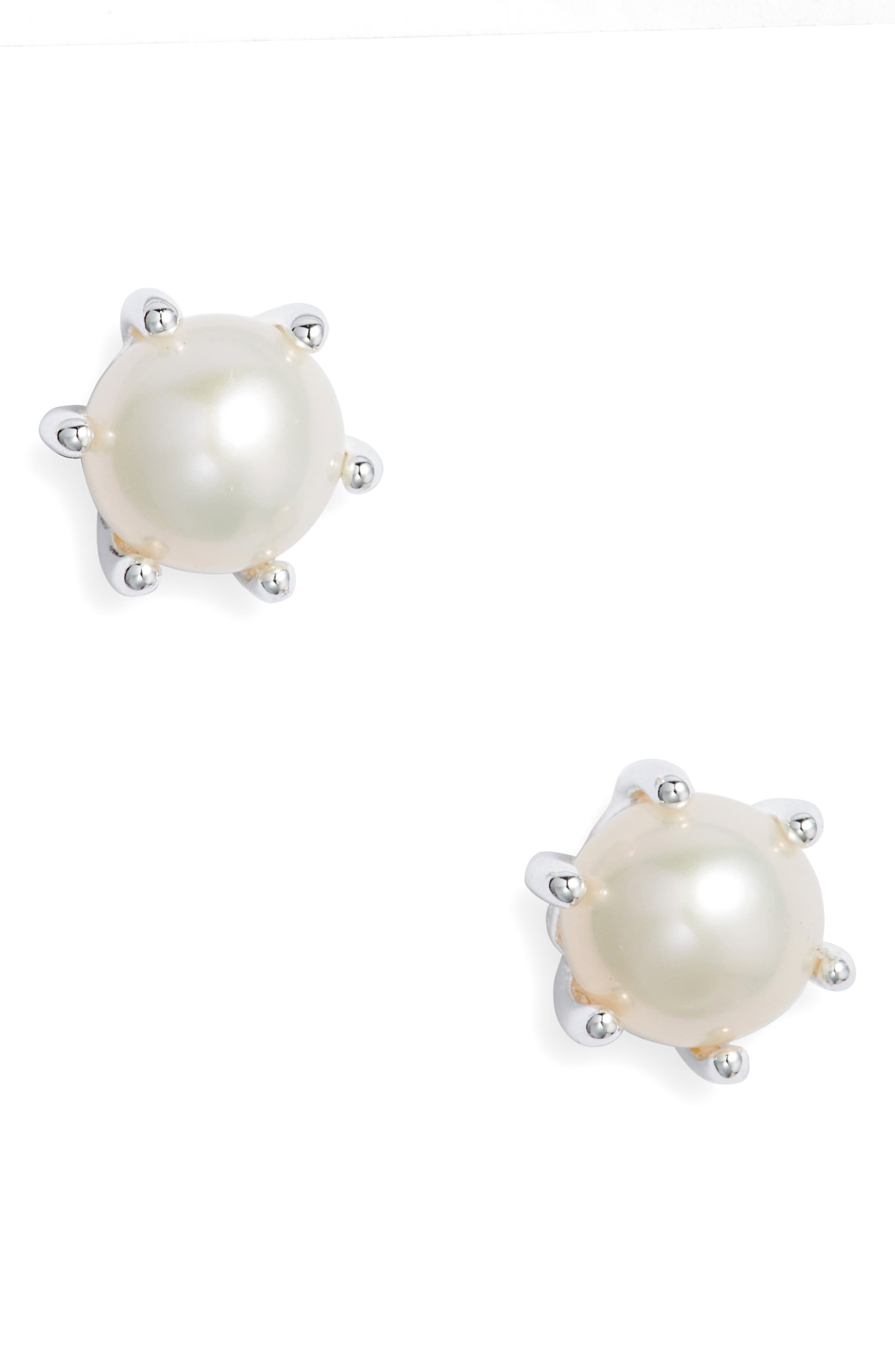 white stud earrings