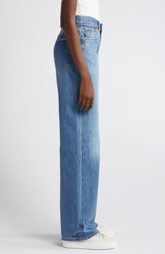 Shop Purple Brand Coated Wide Leg Jeans In Mid Indigo