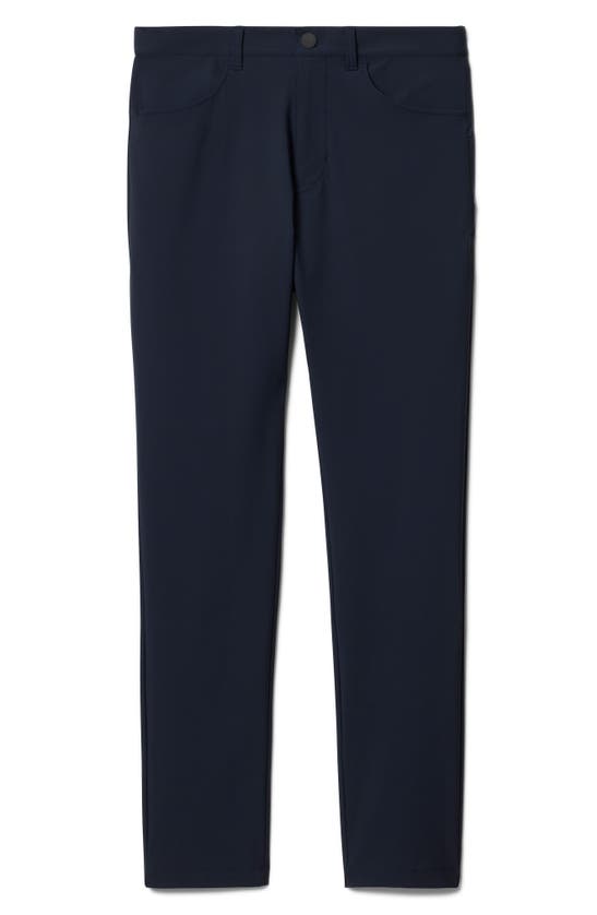 Shop Rhone Momentum Water Repellent Flat Front Golf Pants In True Navy