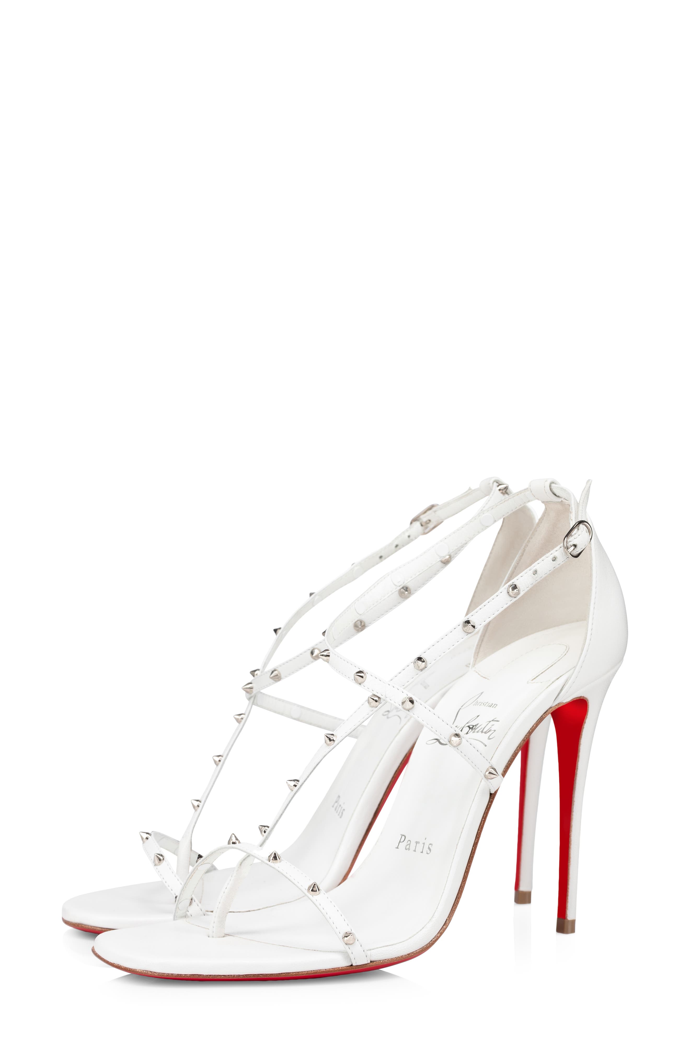 white louboutin heels with spikes