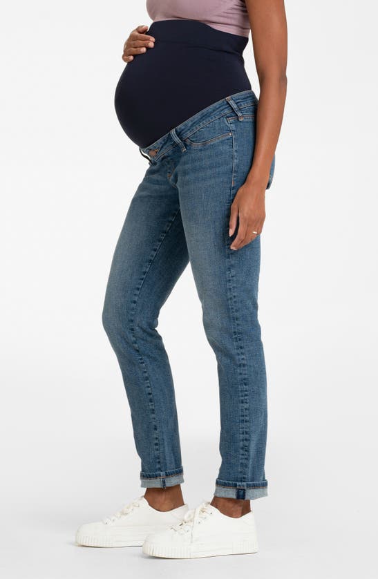 Shop Seraphine Over The Bump Slim Fit Maternity Jeans In Mid Blue