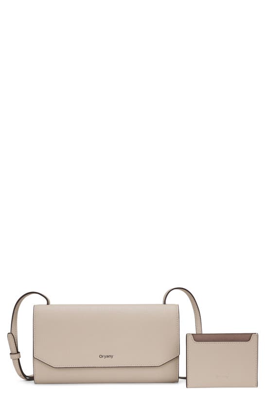 Shop Oryany Mandy Leather Crossbody Wallet In Cream