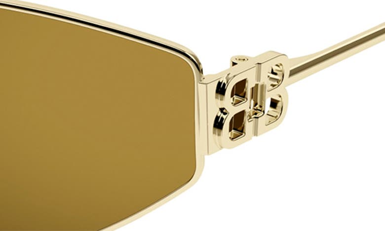 Shop Balenciaga 65mm Oversize Cat Eye Sunglasses In Gold